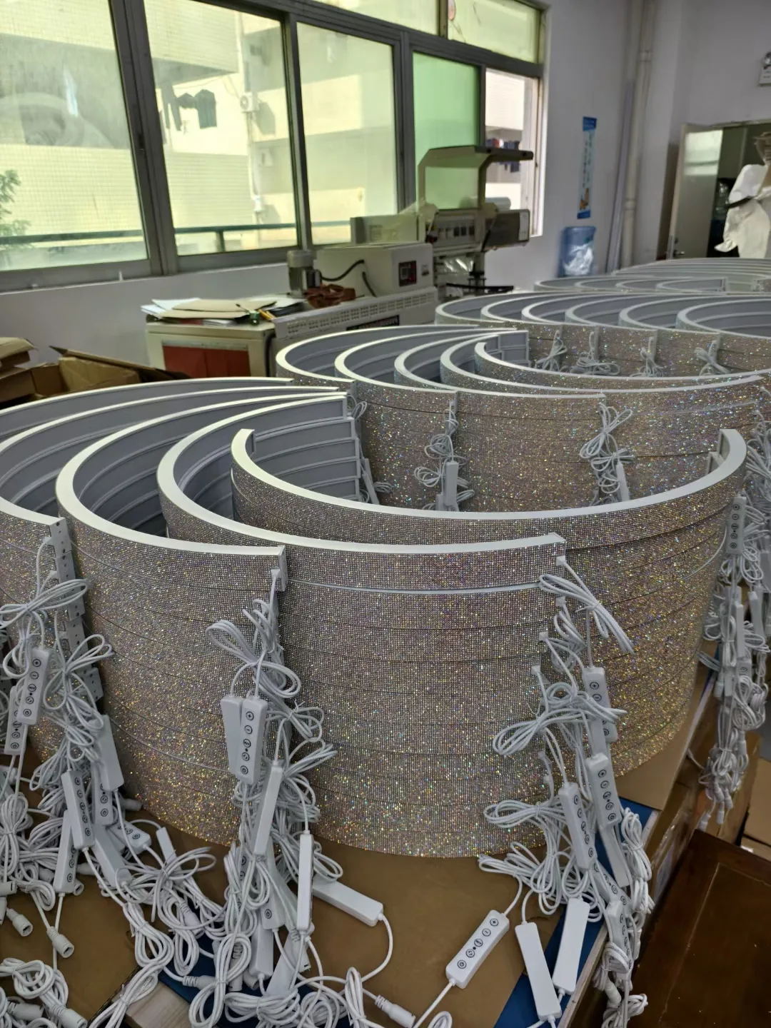 Rows of lamp housings waiting for assembly